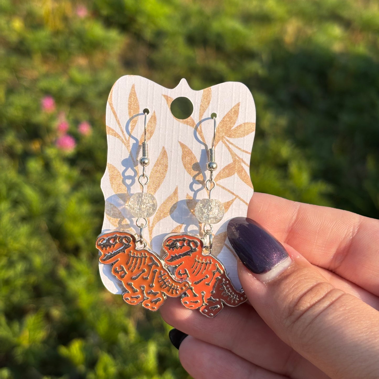 Katie - T-Rex Orange Skeleton Earrings!