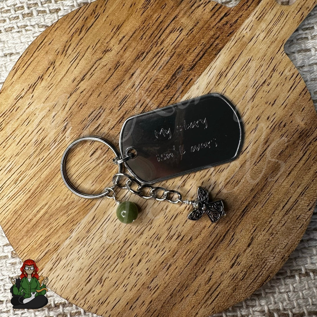 "My Story Isn't Over;" Green Bead & Angel Etched Dog Tag Keychains!