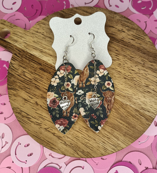 Vida - Charmingly Yours Moo Earrings!